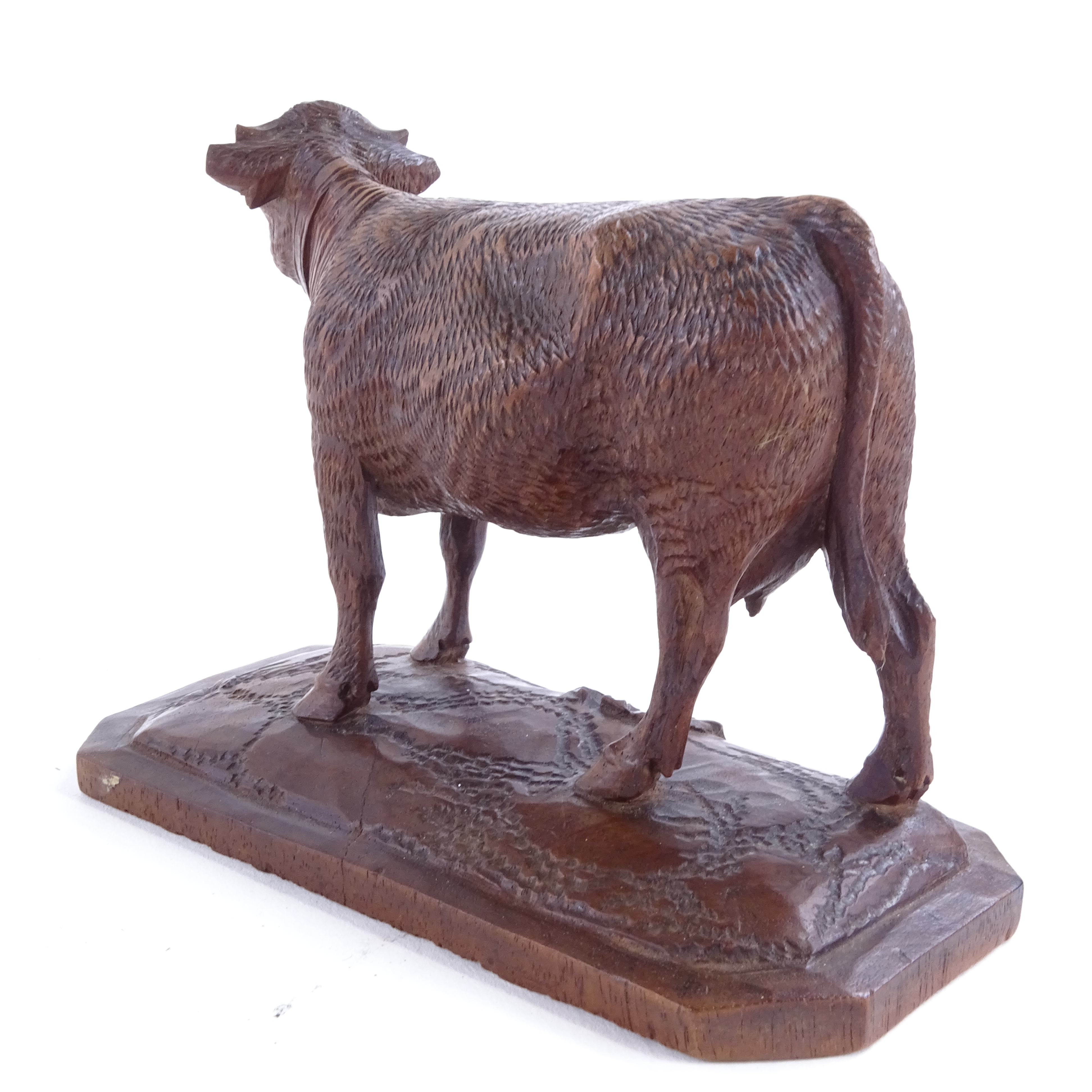 Attributed to Johann Huggler, a finely carved Linden wood Black Forest bell cow, base length 13cm - Image 3 of 3