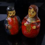 A pair of unusual German Folk Art roly poly figures, circa 1850, weighted papier mache with hand