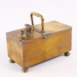 A George III brass tavern honesty tobacco box, circa 1800, with central carrying handle, 2 lidded