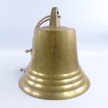 A large polished bronze bell, probably mid-20th century, no impress marks, overall height 28cm,
