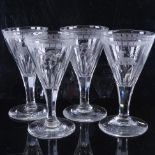 A set of 4 19th century handmade glasses with engraved armorial crests, height 12cm, diameter 6.