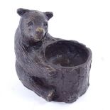 A Black Forest style bronze bear match holder, with hollow tree stump bowl, probably mid-20th