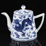 A Chinese blue and white porcelain teapot, with painted dragon design, 6 character mark, height 12cm