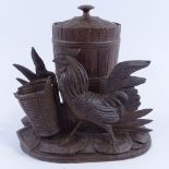 A Black Forest carved and stained wood pot and cover, with a hen figure mount and basket, height