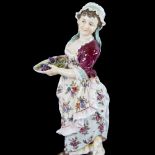 A German porcelain figure of a country girl, height 24cm Several leaf chips in the bowl, no other