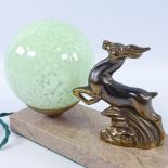 French Art Deco lamp surmounted by a bronze patinated spelter deer, circa 1930, with mottled green