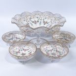 A glass table centre tazza and 6 matching circular dishes, early 20th century, with hand painted and