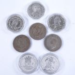 A group of silver and nickel commemorative coins