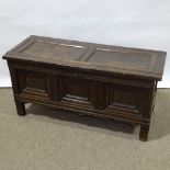 An Antique panelled oak coffer, 17th or 18th century, with inlaid fielded 3-panel front, length