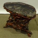 A Chinese polished rootwood table with banded fluorite (Blue John) top, length 70cm, height 50cm The