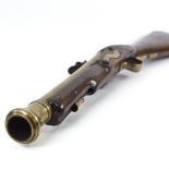 A 19th century flintlock brass-barrelled blunderbuss, with mahogany stock, impressed marks to the