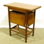 A Victorian Aesthetic Movement fold over table, with fold-out shelves below, 71cm x 38cm