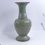 Antique Chinese celadon glaze porcelain vase with incised decoration, height 28cm A number of