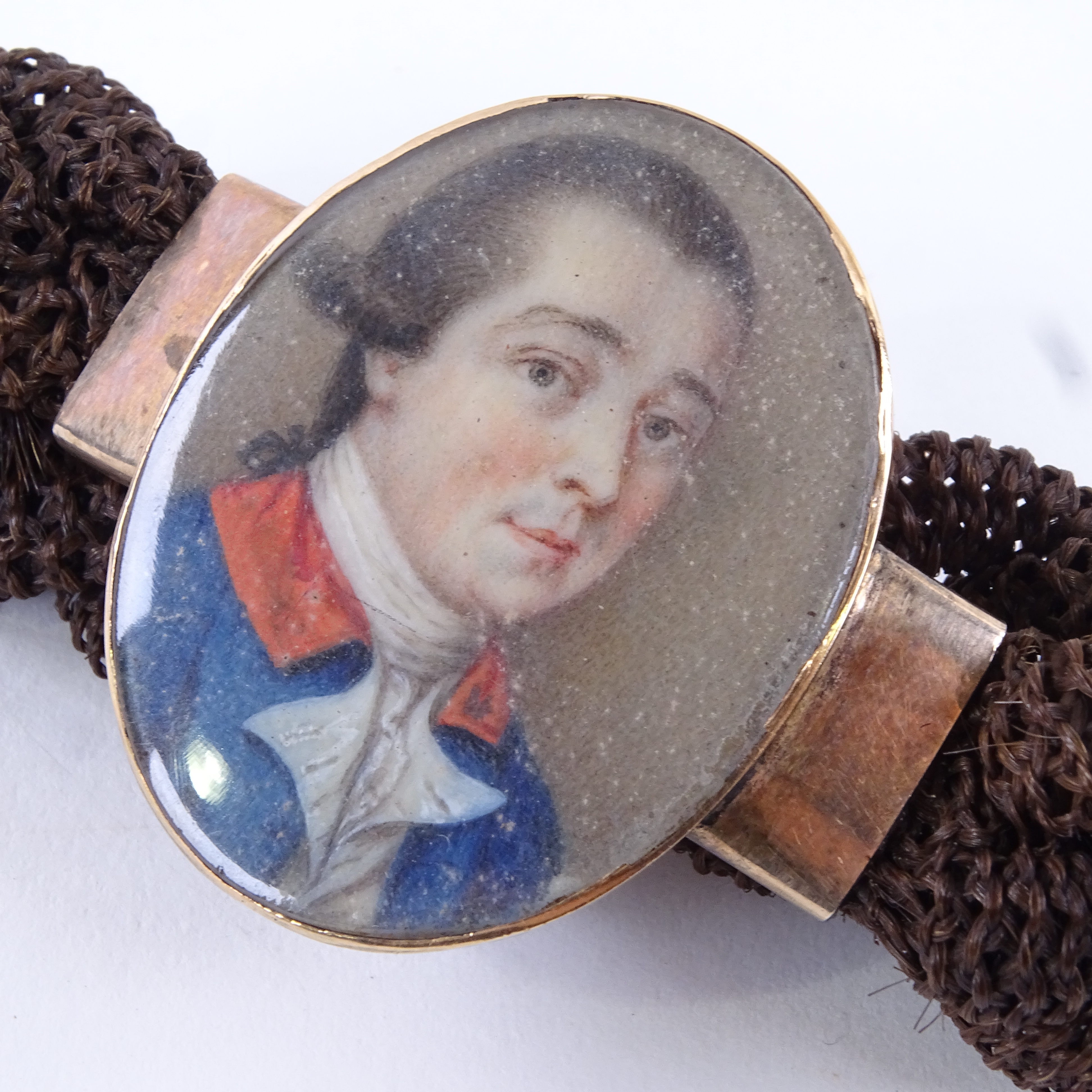 A Georgian woven hair bracelet with central miniature watercolour portrait on ivory, depicting a - Image 3 of 3