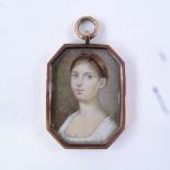 A Georgian miniature watercolour on ivory, portrait of a young lady, unmarked gold pendant frame,