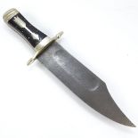 A large hunting knife with damascus steel blade, and nickel cross hilt with horn grips, overall