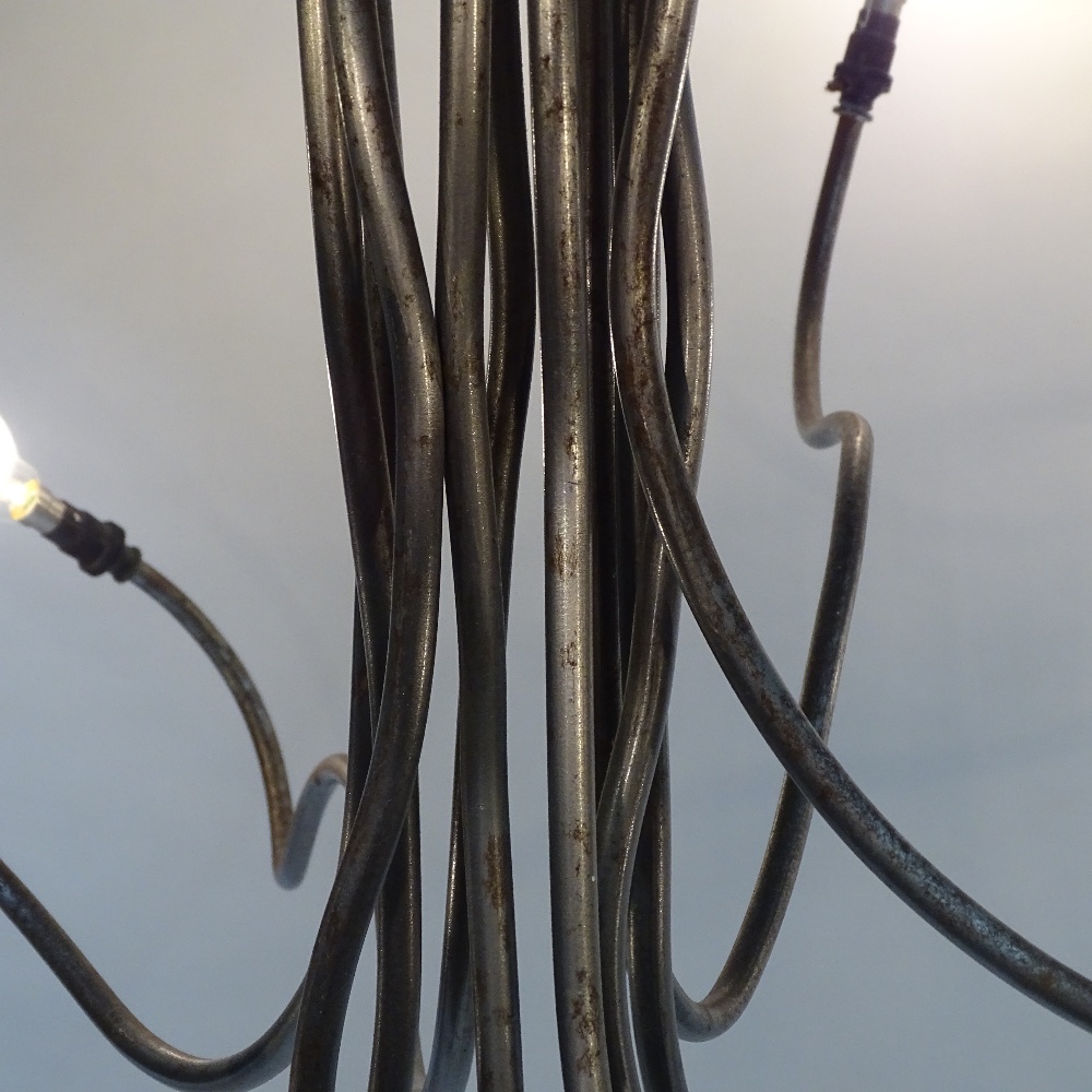 A 1980s' 10 branch chandelier, in the manner of RON ARAD, an abstract form constructed of raw - Image 3 of 4