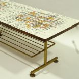 A mid-century, 1960s' coffee table, with cross hatch pattern formica top and gilt metal base,