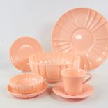 A set of Art-Deco pink plastic tableware, 32 pieces. Good condition.