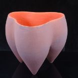 DEANA MOORE, BRITISH, studio pottery vessel in tripod form, orange glaze with blue overlay and