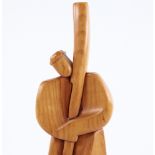 A modern stylised carved wood figure, of a man holding a staff, signed to foot, height 29cm. Good