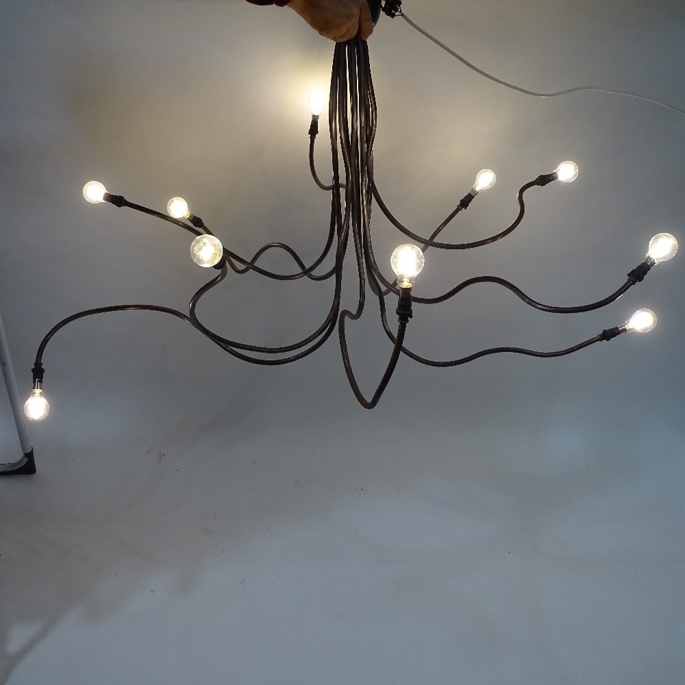 A 1980s' 10 branch chandelier, in the manner of RON ARAD, an abstract form constructed of raw - Image 2 of 4