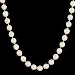 MIKIMOTO - a late 20th century single-strand cultured pearl necklace, with sterling clasp,