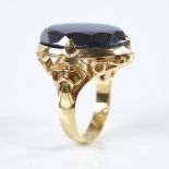 A late 20th century Chinese high carat gold hematite ring, set with a large oval-cut hematite with