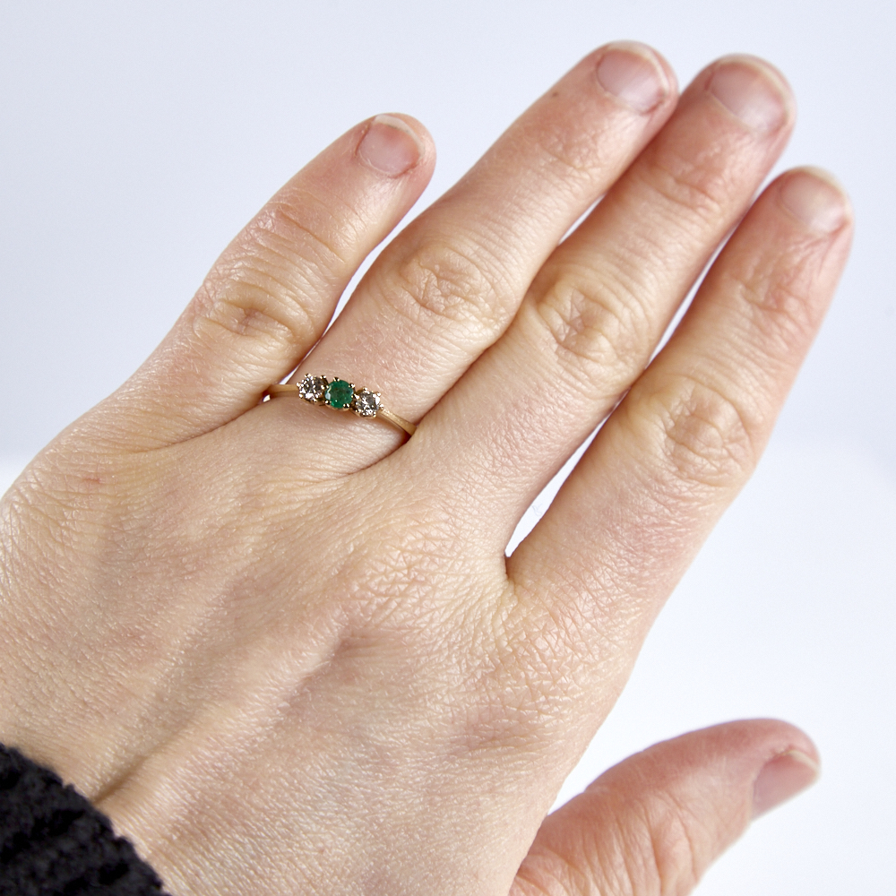 A late 20th century 9ct gold 3-stone emerald and diamond ring, total diamond content approx 0.2ct, - Image 5 of 5