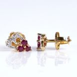 A modern pair of 18ct gold ruby and diamond stud earrings, with screw fittings, earring height 11mm,
