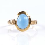 A late 20th century Egyptian high carat gold cabochon turquoise dress ring, setting height 12.9mm,