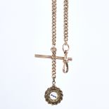 A 12ct rolled gold Albert chain, graduated curb links with T-bar, 9ct gold dog clip, and compass