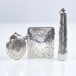 A George V silver Vesta case, a silver cheroot case and matching cheroot holder, and an Elizabeth II