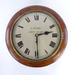 An early 20th century oak-cased circular dial wall clock, by A Powell of Leich-on-Sea, silvered dial