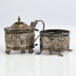 An early 20th century Indian unmarked silver 2-piece cruet set, comprising mustard pot and salt