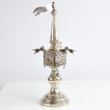 An unmarked silver Judaica besamim spice tower, with pierced openwork body rotating flags and