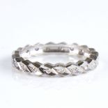 A late 20th century 18ct white gold diamond eternity ring, total diamond content approx 0.1ct,