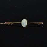 An early 20th century 9ct gold cabochon opal bar brooch, opal dimensions: length - 11.70mm,