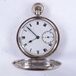 An early 20th century silver full hunter pocket watch, white enamel dial with black Roman numeral