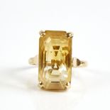 A late 20th century 14ct gold citrine dress ring, set with large emerald step-cut citrine, citrine