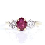 A late 20th century 18ct gold 3-stone ruby and diamond ring, set with oval mixed-cut ruby and