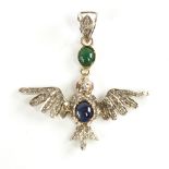 A modern Continental silver sapphire ruby emerald and diamond figural bird pendant, set with oval