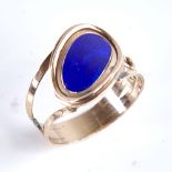 A mid-19th century unmarked rose gold blue enamel panel mourning ring, back inscribed "Mary Bonne..?