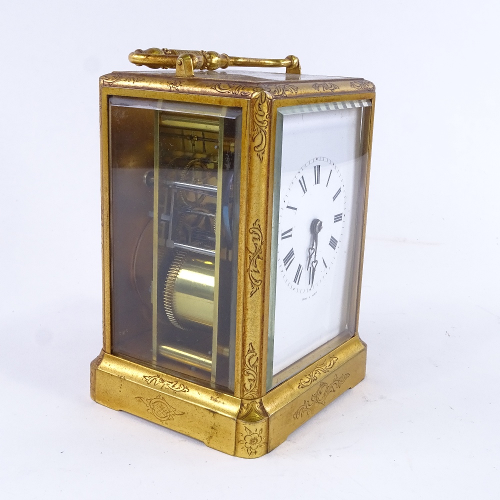 A 19th century French brass 8-day striking carriage clock, by Jules of Paris, white enamel dial with - Image 2 of 5