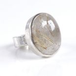 A modern sterling silver and cabochon rutilated quartz dress ring, setting height 22.4mm, size M,