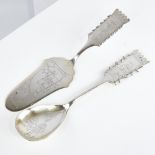 A Vintage Swedish silver serving spoon and a similar cake slice, engraved reindeer and Lapp