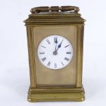 A 19th century brass 8-day striking repeater carriage clock, white enamel dial with Roman numeral