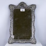 A large Elizabeth II silver-fronted rectangular mirror, relief embossed foliate surround, by Francis