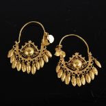 A pair of Turkish gold crescent hoop earrings, pierced wirework decoration with en tremblant beehive