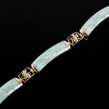 A modern Chinese 9ct gold jade bracelet, with character mark spacers, bracelet length 8cm, 11.7g